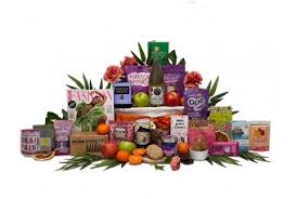 The set consists of a blanket, pillow, glove, tote bag, and a neck comforter. Get Well Gifts Gift Baskets