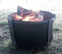 During my second or third year my dad and one of my den leaders, steve, came up with a design for a fire pit, and a grill. Hobo Fire Pit Made From A 55 Gallon Drum 55 Gallon Drum Fire Pit 55 Gallon