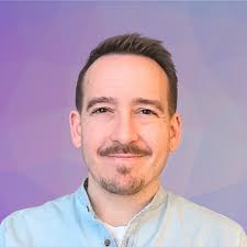 BT headshot w geo bkgrd