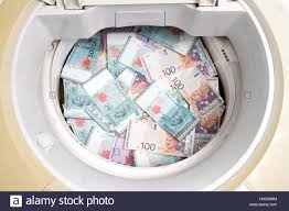 However, its formal and informal financial sectors are vulnerable to abuse by narcotic traffickers, financiers of terrorism, and criminal elements. Money Laundering Concept With Ringgit Malaysia Notes In Washing Machine Stock Photo Alamy