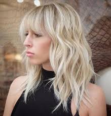 Other than buzzing your all of your hair off, growing a fringe is one of the few ways you can use your hair to noticeably change the shape of your face. 40 Styles With Medium Blonde Hair For Major Inspiration