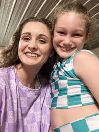 Ashlyn and one of her BFFs looking cute in BPA clothing at their music  program today!!