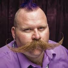 Hello my name is Bill Petersen I am 36 and a man of many faical hair looks.  This pic is from when I won the North American Championships in Denver last  September.