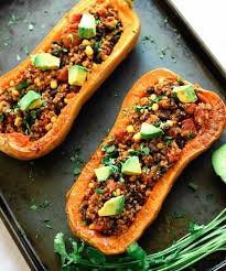 These Vegan Stuffed Butternut Squash Boats Are Filled With Black Beans Quinoa And Fire Roasted Tomat In 2020 Butternut Squash Butternut Squash Recipes Squash Recipes