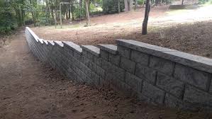 Some serve simple purposes, such as creating raised planting borders around the edge of your backyard. Retaining Wall Ideas For Sloped Backyard Sequoia Stonescapes
