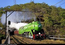 Former Nsw Government Railways Pacific Locomotive 3801 Races Out Of The Long Island Tunnel And Onto The Hawkesbury Ri Steam Train Photo Locomotive Old Trains