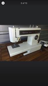 (and cutting drives) now you take a screwdriver with a flat head and you notice two or three screws on top of the sewing machine (at the mine they were sunk about an inch down.) and then gently lift the upper body up and away from the thing. Bought My Wife A Kenmore Ultra Stitch 12 For 40 Did I Do Well All The Parts Are There And It Works Just Fine Sewing