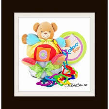 European Design And Everyday Practicality Are Paired In This Unique Baby Diaper Cake Or Baby Shower Centerpiece Included In This Beautiful Upscale Baby Gift Is