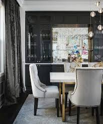 Dark Gray Velvet Curtains Add A Pop Of Drama To A Gorgeous Gray And Black Dining Room With Gold Accents Fitted Black Dining Room Velvet Dining Chairs Interior