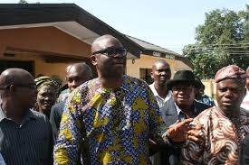 Image result for fayose pic giving 100 million
