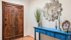 For a roomy area, select heavier wooden furniture with metal accents. How To Decorate A Foyer Table Like A Pro Home Design Lover