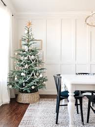 Wood bead garland christmas tree. 100 Holiday Decor Finds For A Cozy Minimal Look Caitlin Marie Design