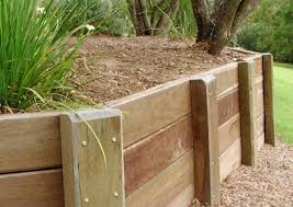 The existing wall that was there was leaning inward two feet because it was build with wire anchors this will secure the base timber. Retaining Walls Landscaping Woodsolutions