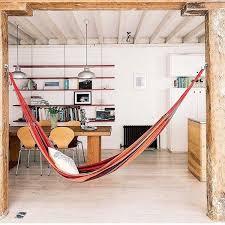 This is a hammock hanging guide explaining how to hang a hammock indoors safely. 15 Indoor Hammocks That Are So Cool Lonny