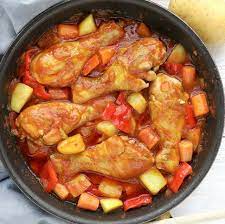 Try This Chicken Afritada Recipe A Filipino Chicken Stew In Tomato Sauce With Carrots Potatoes And Bell Peppe Recipes Chicken Afritada Recipe Stuffed Peppers