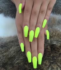 You can have neon yellow nail designs as summer nails. Summer Neon Nails Bright As You Like Neon Yellow Manicure On Ballerina Shaped Long Nails Solarglaze X Neon Acrylic Nails Neon Nail Polish Neon Nails