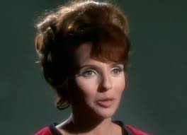 Why was Tuvok demoted between his post