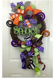 Halloween wreaths are a thing and they're cooler than you think. Spooky Grapevine Wreath Halloween Grapevine Wreath Colorful Etsy Halloween Wreath Fall Halloween Decor Halloween Deco Mesh