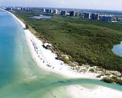 Visiting florida for the first time i found myself at pelican's on the pier in sunny isles beach. Pelican Bay Naples Fl Aerial View Of Clam Pass Great Swimming Beach Walks Sandbar Restaurant Beautiful Places On Earth Pelican Bay Pelican Bay Naples