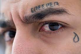 The teardrop tattoo or tear tattoo is a symbolic tattoo of a tear that is placed underneath the eye.the teardrop is one of the most widely recognised prison tattoos and has various meanings. Teardrop Tattoo Dictionary Com