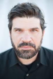 Pennsylvania's U.S. Senators John Fetterman and Dave McCormick, sit down  together at Fetterman's home across the street from U.S. Steel's Edgar  Thomson Works in Braddock, Pa., in February. Pennsylvania is one of