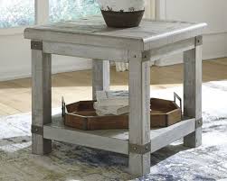 These living room end table are offered in various shapes and sizes ranging from trendy to classic ones. The Carynhurst White Wash Gray Rectangular End Table Available At Barnett And Swann In Athens Al