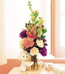 New baby gifts & flowers. Bear Hug With White Roses Nothing Like Some Colorful Flowers And A White Bug To Cheer Someone Up Valentines Flowers New Baby Flowers Flower Delivery