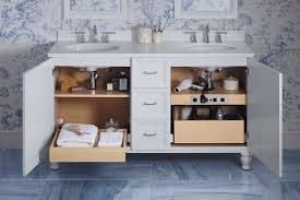 Hang a set of wire baskets to keep the clutter off your bathroom counter. How To Organize Your Bathroom Cabinets