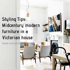 Look to wood grain, funky patterns, and touchable textures to capture the essence of this iconic style. Midcentury Modern Furniture In A Victorian House Styling Tips Nina S Apartment