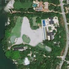 Tiger woods' windmere home is for sale at $5.6 million, boasting a lake view, a personal pool, a this also shows the back of the house with beige exteriors complemented by the large glass wall and. Tiger Woods House And Net Worth In Jupiter Island Fl Virtual Globetrotting