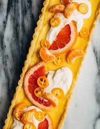 A Bright And Creamy Grapefruit Curd Tart Baked Up In A Classic Pate Sucree Crust That S Perfect For Celebratory Winter Meals Grapefruit Curd Tart Baking Curd