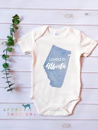 Loved In Alberta Organic Baby Onesie Alberta Albertacanada Albertababy Calgary Calgaryonesie Albe Baby Onesies Handmade Baby Clothes Organic Baby Clothes