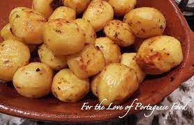 Portuguese Roast Potatoes 2 5 Lb Peeled Small Potatoes 2 Tsp Butter 1 C White Wine 5 Tbs Olive Oil Ch Parsley 3 Minced Portuguese Recipes Recipes Savoury Food