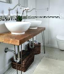 For a tighter bathroom, you can maximize the space with the use of peg rails rather than of towel bars. Bathroom Vanity Decorating Ideas Pinterest Small Bathroom Vanity Ideas Unique To Bathro Bathroom Vanity Decor Unique Bathroom Vanity Small Bathroom Vanities