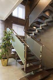 You can choose to have only some glass parts in the stairway rather than a full staircase made of glass. 50 Staircases With Tile Flooring Photos Modern Staircase Railing Design Glass Stairs