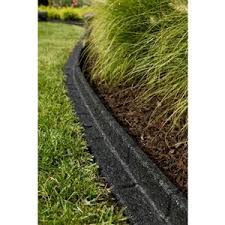 Find the right outdoor on sale to help complete there is also shallow edging held in place by spikes, so there's no need for digging. Rubberific 4 Ft Black Landscape Edging Section Lowe S Canada