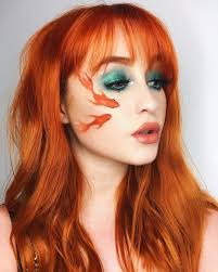 Kellytrucco Cute Little Koi Fish Perfectly Compliment Her Fiery Copper Locks She Diluted Sunset Orang Hair Color Orange Arctic Fox Hair Color Fish Makeup