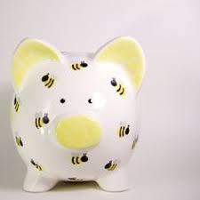 Coins fall into piggy bank painted with flag. 490 Painted Piggy Banks Ideas Piggy Piggy Bank Personalized Piggy Bank