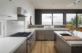 Modern Metal Kitchen Cabinets With White Caesarstone Countertop Kitchen Island White Modern Kitchen Kitchen Design Modern Metal Kitchen