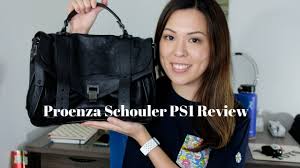 Crafted from leather, it is held by a top handle and a shoulder strap. Designer Handbag Review Proenza Schouler Ps1 Medium Youtube