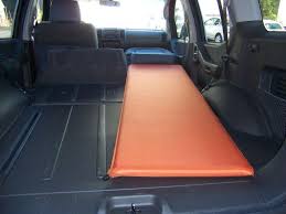 Sleeping In The Back Of The Xterra Second Generation Nissan Xterra Forums 2005 Nissan Xterra Motorcycle Camping Gear Camping Gear