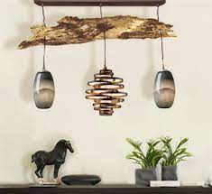 This hanging lamp provides a rustic look to your space. How To Make A Driftwood Pendant Light