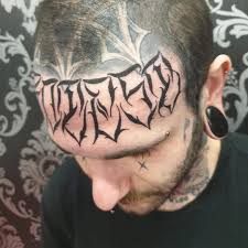 Image result for quirky pylon forehead tattoo