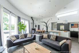Le Salon De Cette Maison D Hotes Affiche Un Style Scandinave Ultra Moderne Maison D Hotes Chambre D Hote Mobilier De Salon