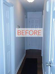 How To Brighten A Long Narrow Hallway Diy Dark Hallway Narrow Hallway Decorating Hallway Wall Colors