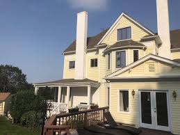 Aspen is a common name for certain tree species; Global Home Improvement Roof Replacement Photo Album Installing Aspen Bronze Standing Seam Metal Roof On Beach Home In Atlantic Highlands Nj
