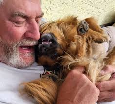 Dad, it's time to do our yoga. This is how you start Upward Dog. Don't  forget to stick your tongue out. It helps with concentration and balance.  Let's go!