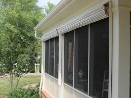 A deep screened porch with high ceilings, in this case 11 feet high, provides cooling shade to this southern home. Weather Queen Screen Porch Shades Porch Shades Screened In Porch Diy Screened Porch