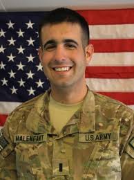 Left: Gen. John Allen, the commander of the NATO International Security  Assistance Forces learns how to create a Materiel Releas