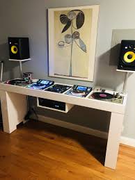 Creative artwork decoration of dj table on dark toned background with lights and fog. Dj Set Up Dj Room Dj Set Up Dj Table